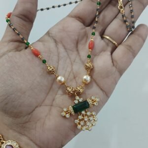Gold copy pendant with black diamonds