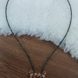 Jadau pendant with black diamonds