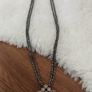 Real black diamonds with Lakshmi pendant