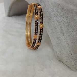 Black stone with gold flower pattern