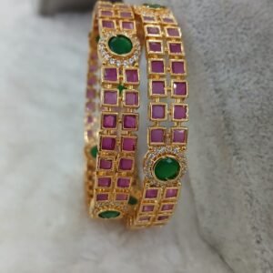 Square pattern ruby with green stone