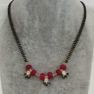 Pink pumpkin black beads with Kundan drops