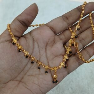 Gold ball with black Crystals