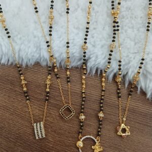 Stone pendant with blackbeads