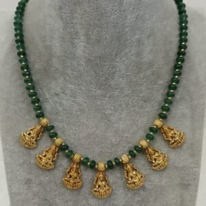 Green beads with Lakshmi pendants