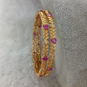Leaf design with Ruby stones
(set of 2)