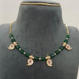 Green beads with small mango pendants