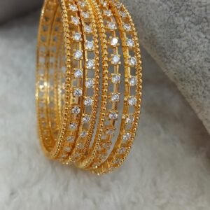 White stpne side frame pattern bangles (set of 4)