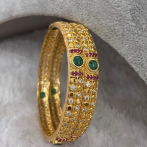 Hand cut design with green stone bangles