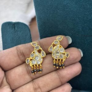 White polki studs with black diamonds