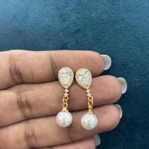 Drop shape stone with pearl hangings