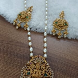 26 inches oval pearls chain with lakshmi nakshi pendant and earrings