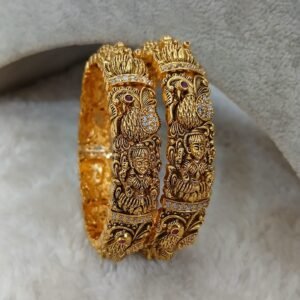 2.8 Heavy gold copy nakshi with lakshmi & Peacock detailing (set of 2)