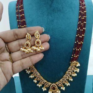 Red spinels with mango pendant and earrings