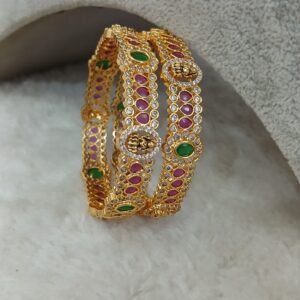 2.4 Bridal Micropolish bangles with lakshmi & ruby stones (set of 2)