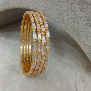 2.6 White glass cut with gold ball Micropolish bangles (set of 4)