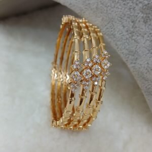 2.6 Gold copy white stonea plain pattern Micropolish bangles (set of 4)