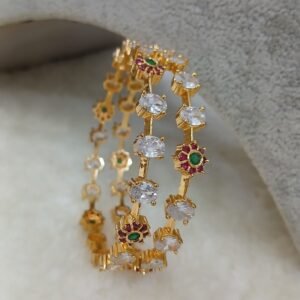 2.6 Uncuts with small ruby stone flower Micropolish bangles (set of 2)
