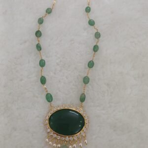 Green stone pendant with emeralds chain
